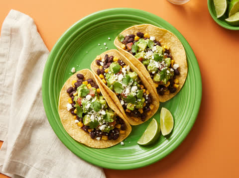 Black bean and corn tacos with avocado salsa