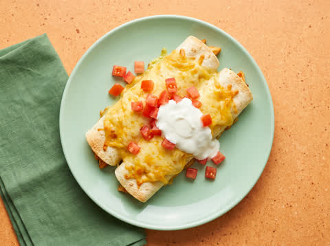 Cheesy chicken enchiladas with zingy tomato