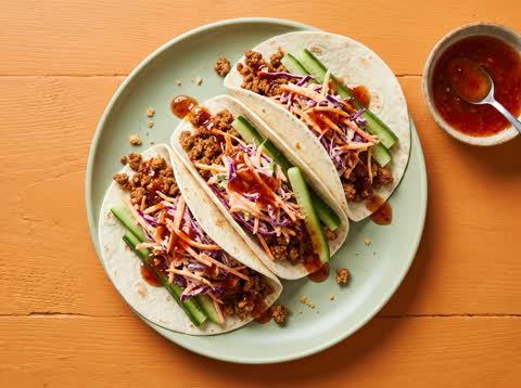 Malaysian pork tacos with creamy slaw