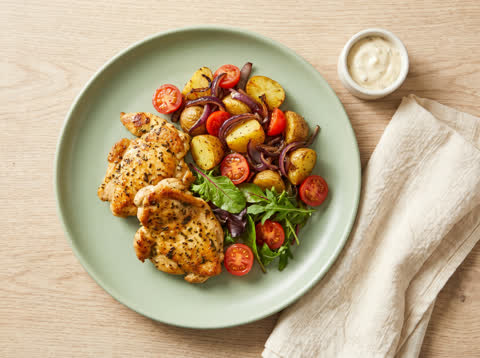 Seasoned chicken with warm roast potato salad